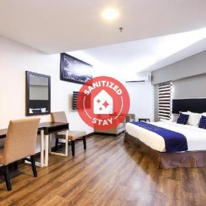 Capital O 978 midaris Hotel