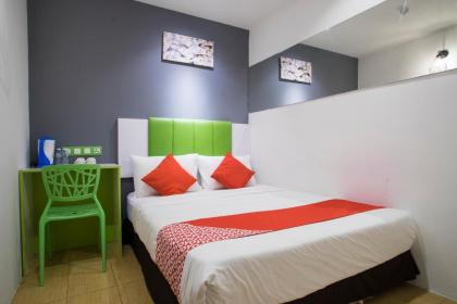 OYO 1003 Rich Calton Hotel - image 18