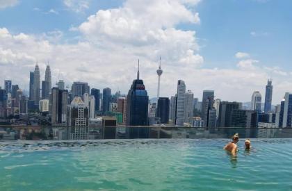 Staycation with Infinity Pool at Regalia Suites KL - image 1