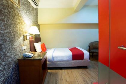 OYO 90125 Hotel Grand Orchard - image 13