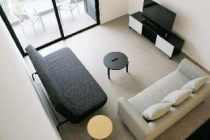 A Comfy & Cozy High-Floor Loft at EST Brickfields
